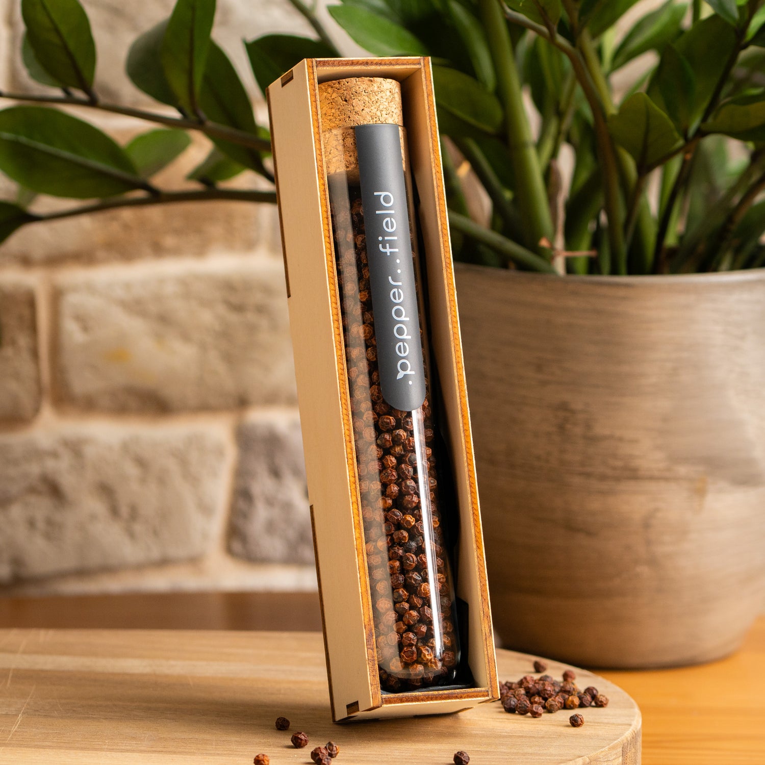 Large test tube with red Kampot pepper in a gift box 